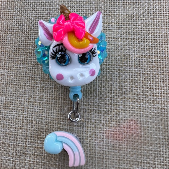 Unicorn badge reel with blue rhinestones - Picture 2 of 5